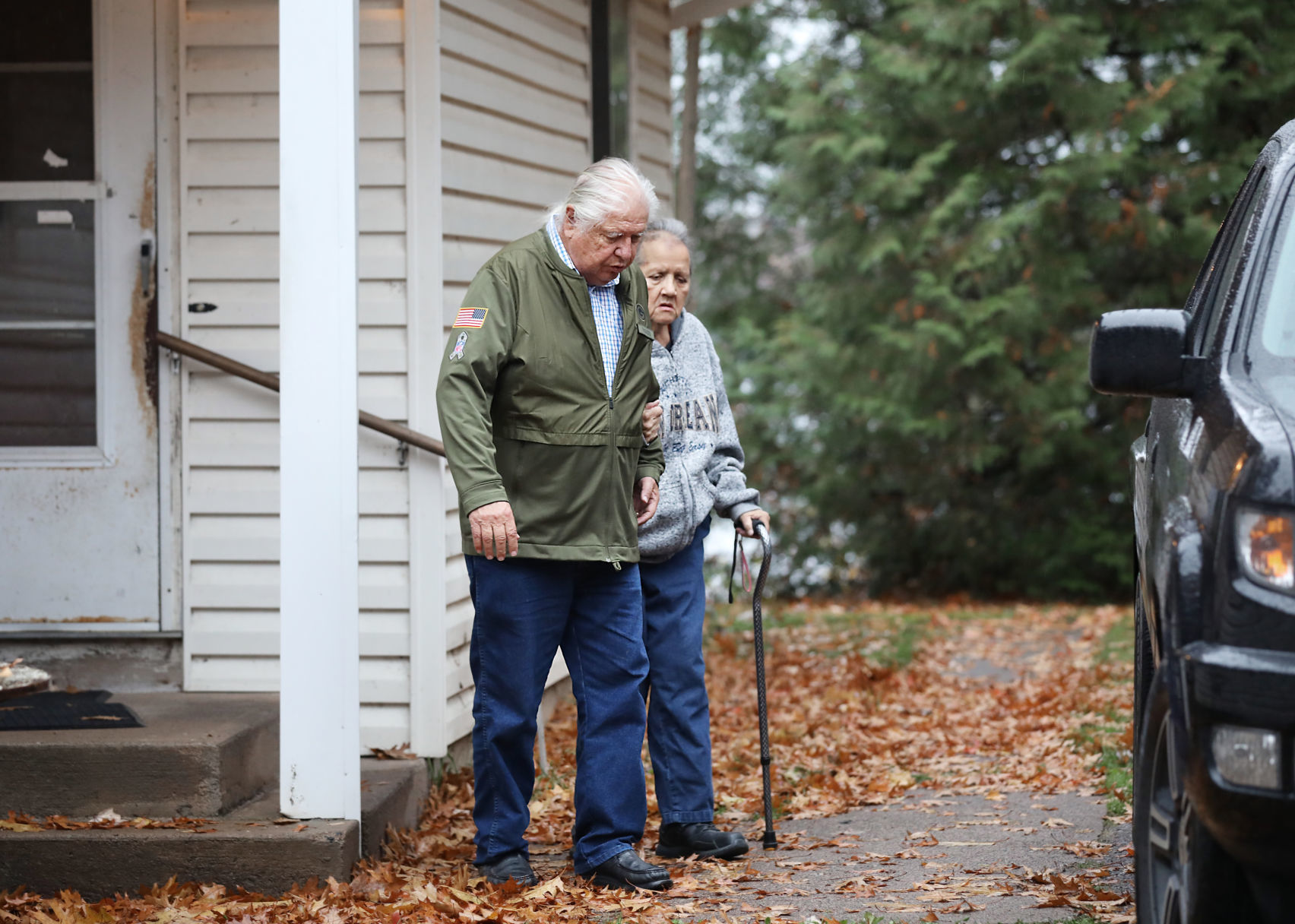 Bill and Jacqui outside of their home